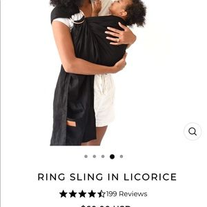 KYTE ring sling baby carrier. color black with rose gold handle